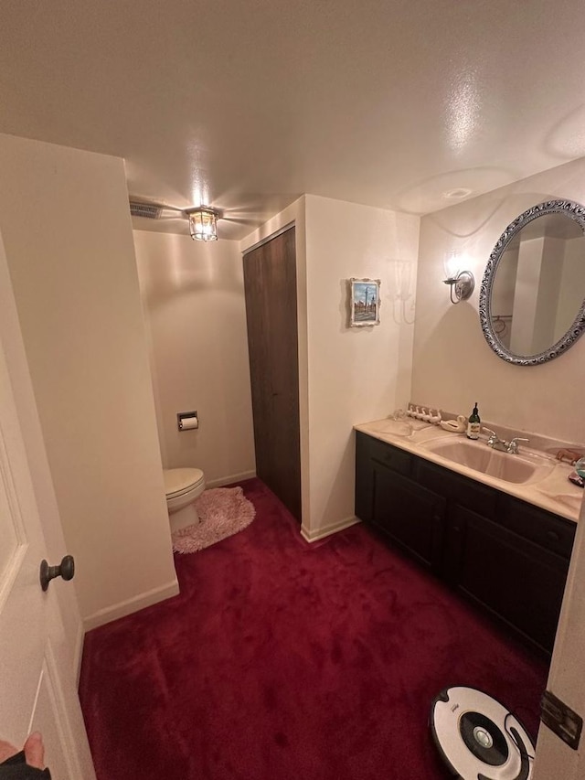 1927 Mission Hills Ln, Northbrook, IL 60062 - bathroom featuring toilet, vanity, and baseboards