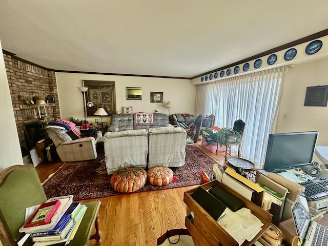 1927 Mission Hills Ln, Northbrook, IL 60062 - living room featuring wood finished floors, a fireplace, and crown molding