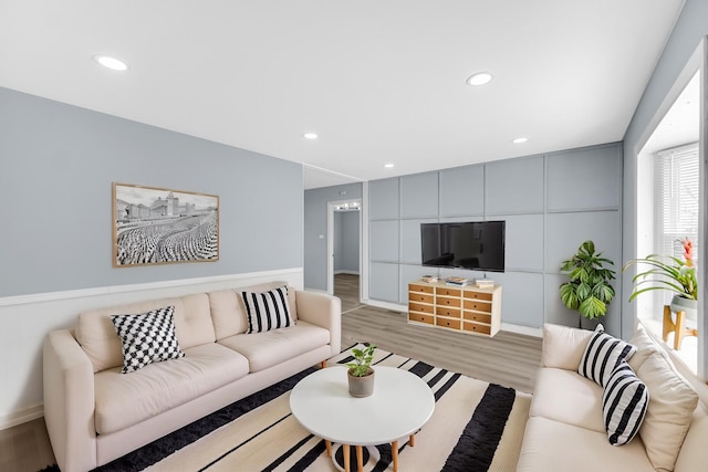 living room featuring recessed lighting and light wood-type flooring