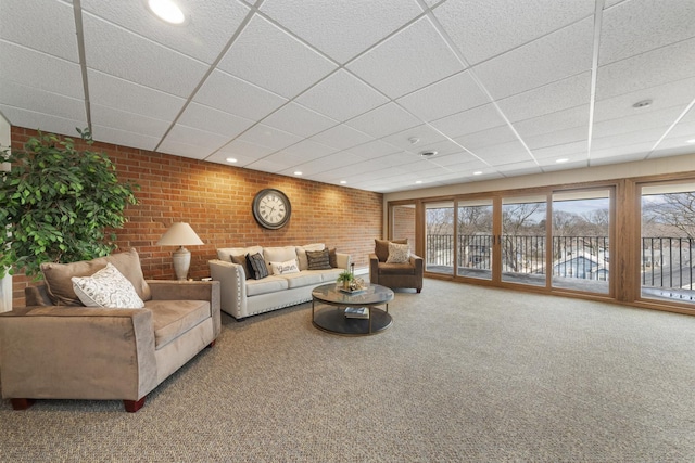 4221 Saratoga Ave Unit 310-A, Downers Grove, IL 60515 - living room with carpet flooring, recessed lighting, a paneled ceiling, and brick wall