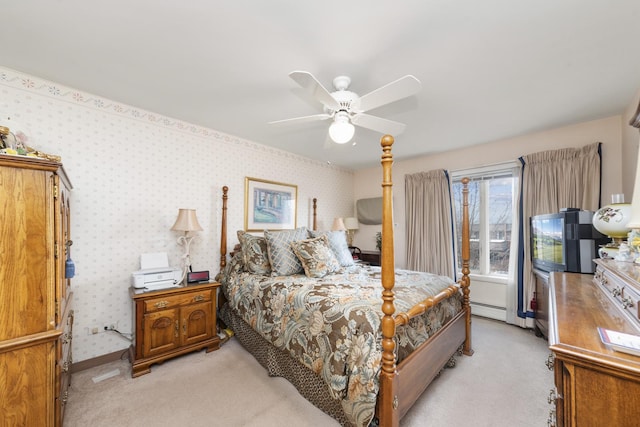 4221 Saratoga Ave Unit 310-A, Downers Grove, IL 60515 - bedroom with light colored carpet, wallpapered walls, a baseboard radiator, and a ceiling fan