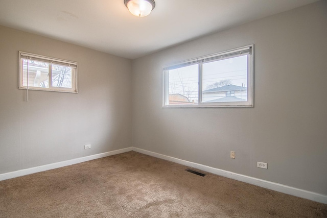 1344 Superior Ave, Calumet City, IL 60409 - unfurnished room with visible vents, baseboards, and carpet