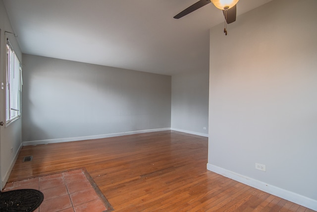 1344 Superior Ave, Calumet City, IL 60409 - empty room featuring visible vents, baseboards, ceiling fan, and wood finished floors