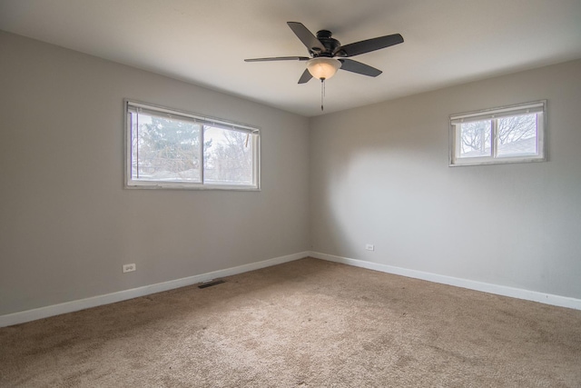 1344 Superior Ave, Calumet City, IL 60409 - spare room featuring a wealth of natural light, visible vents, baseboards, and carpet flooring
