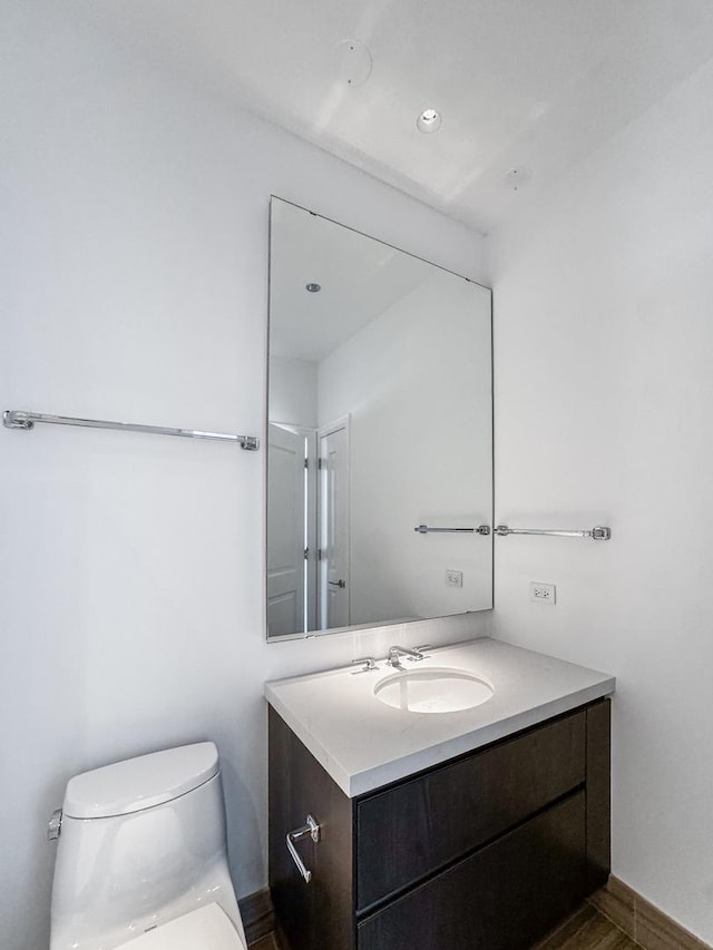 363 E Wacker Dr Unit 6306, Chicago, IL 60601 - bathroom featuring vanity, toilet, and wood finished floors