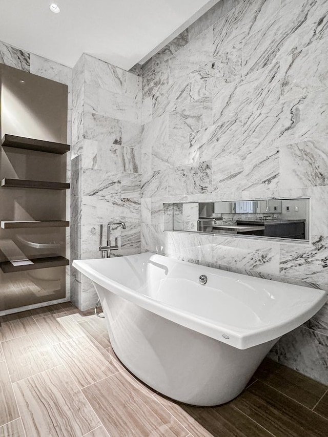 363 E Wacker Dr Unit 6306, Chicago, IL 60601 - full bathroom with tile walls and a freestanding bath