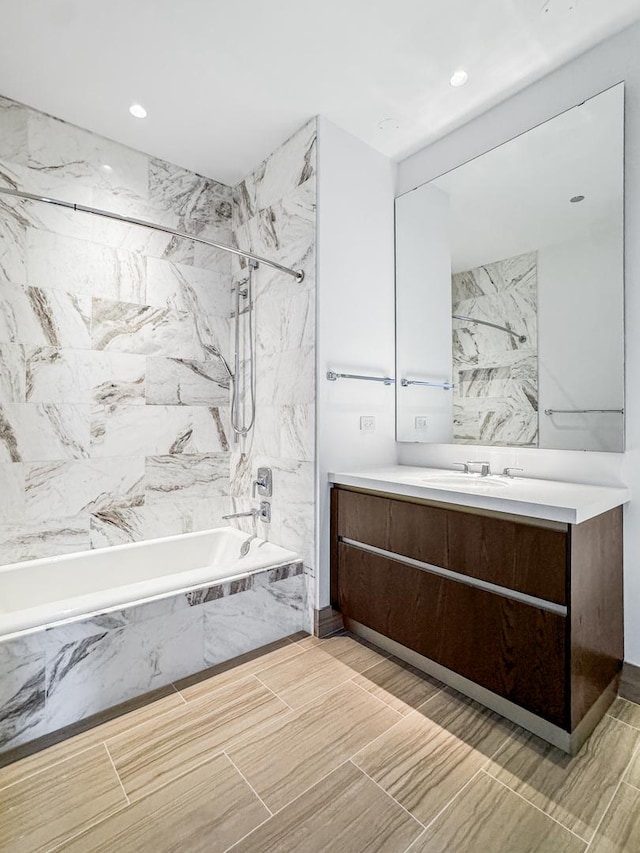 363 E Wacker Dr Unit 6306, Chicago, IL 60601 - bathroom featuring vanity and a combined bath / shower with marble appearance