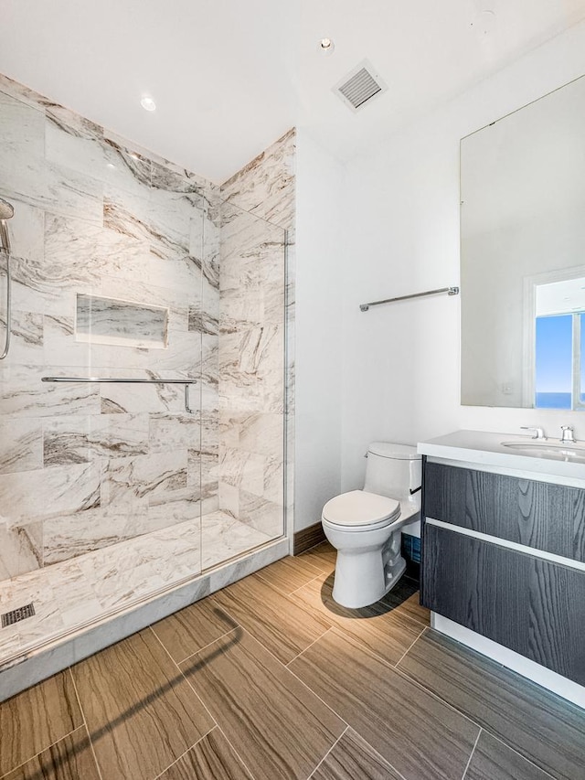 363 E Wacker Dr Unit 6306, Chicago, IL 60601 - full bathroom with vanity, toilet, and a marble finish shower