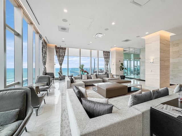 363 E Wacker Dr Unit 6306, Chicago, IL 60601 - common area with floor to ceiling windows, a water view, and recessed lighting