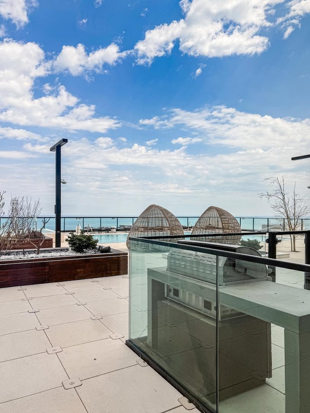 363 E Wacker Dr Unit 6306, Chicago, IL 60601 - view of patio featuring a water view and area for grilling
