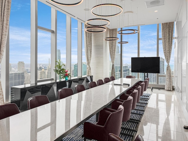 363 E Wacker Dr Unit 6306, Chicago, IL 60601 - dining area with plenty of natural light, a wall of windows, and a city view