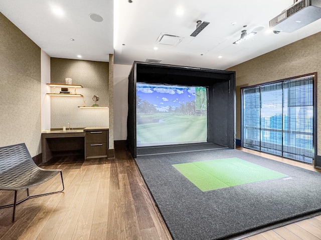 363 E Wacker Dr Unit 6306, Chicago, IL 60601 - playroom with golf simulator, wood-type flooring, and a textured wall
