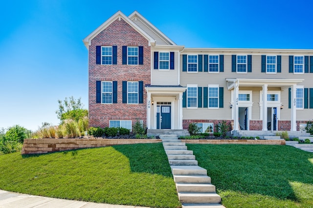 3905 Neubauer Cir Unit 204, Lindenhurst, IL 60046 - view of front of home featuring a front yard and brick siding