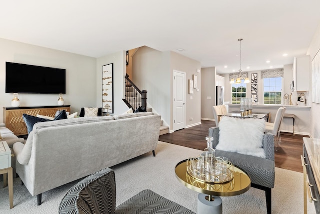3905 Neubauer Cir Unit 204, Lindenhurst, IL 60046 - living area with stairway, dark wood finished floors, recessed lighting, baseboards, and a chandelier