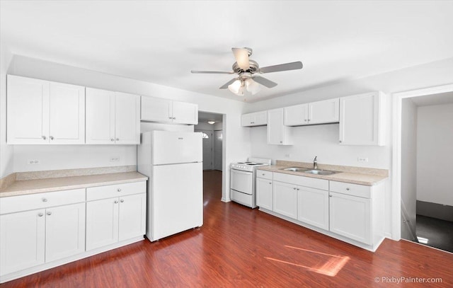 kitchen featuring white cabinetry, ceiling fan, a sink, and white appliances