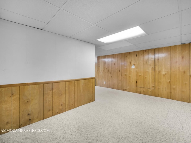 173 Pomeroy Ave, Crystal Lake, IL 60014 - finished basement with a drop ceiling, wood walls, carpet flooring, and a wainscoted wall