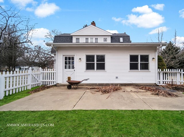 173 Pomeroy Ave, Crystal Lake, IL 60014 - rear view of property with a patio, a shingled roof, and a chimney