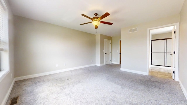750 Sedgegrass Dr, Champaign, IL 61822 - empty room with light colored carpet, ceiling fan, and baseboards