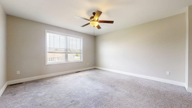 750 Sedgegrass Dr, Champaign, IL 61822 - carpeted spare room featuring a ceiling fan and baseboards