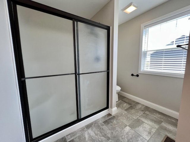 750 Sedgegrass Dr, Champaign, IL 61822 - bathroom with baseboards, a stall shower, and toilet
