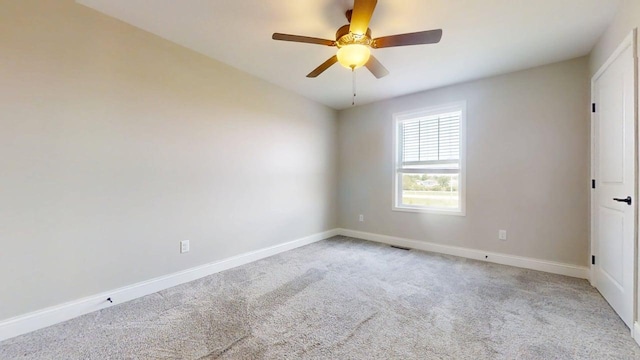 750 Sedgegrass Dr, Champaign, IL 61822 - carpeted empty room with a ceiling fan and baseboards