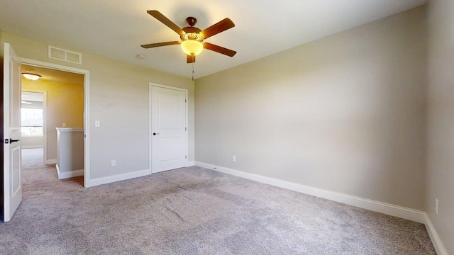 750 Sedgegrass Dr, Champaign, IL 61822 - unfurnished bedroom with carpet flooring, baseboards, and ceiling fan
