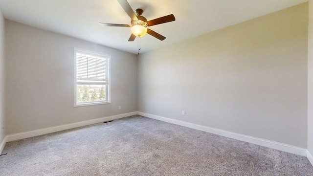 750 Sedgegrass Dr, Champaign, IL 61822 - unfurnished room featuring carpet floors, baseboards, and a ceiling fan