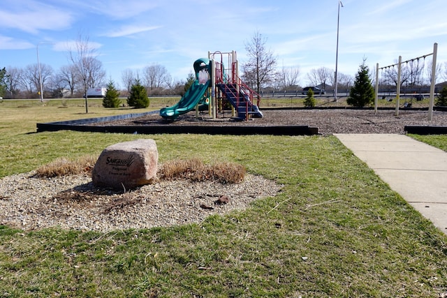 750 Sedgegrass Dr, Champaign, IL 61822 - communal playground featuring a yard