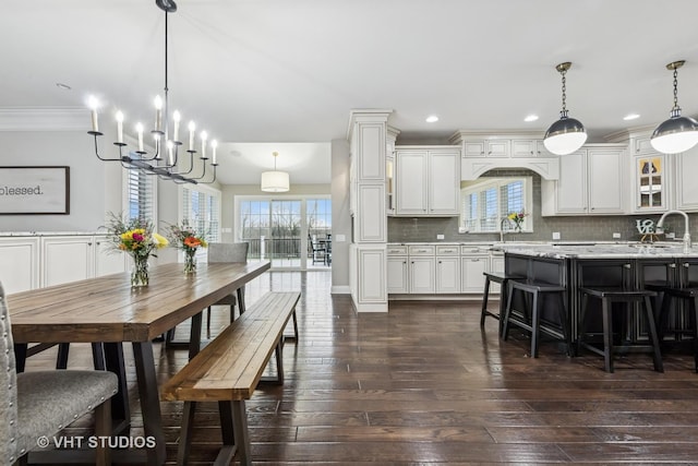 6 Shenandoah Cir S, Barrington, IL 60010 - dining room featuring dark wood-style floors, a chandelier, a wealth of natural light, and ornamental molding