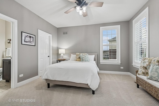 6 Shenandoah Cir S, Barrington, IL 60010 - bedroom with light colored carpet, visible vents, ensuite bathroom, and baseboards