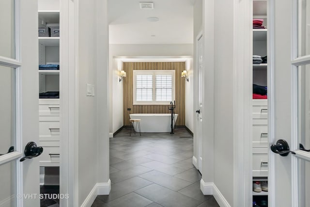 6 Shenandoah Cir S, Barrington, IL 60010 - hallway featuring dark tile patterned flooring and baseboards