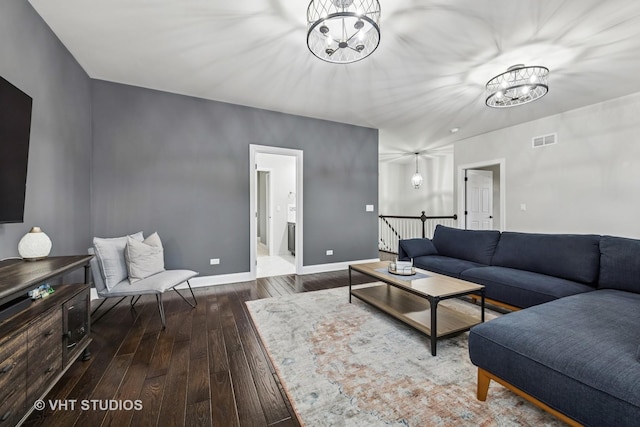 6 Shenandoah Cir S, Barrington, IL 60010 - living room with baseboards, visible vents, hardwood / wood-style flooring, and an inviting chandelier