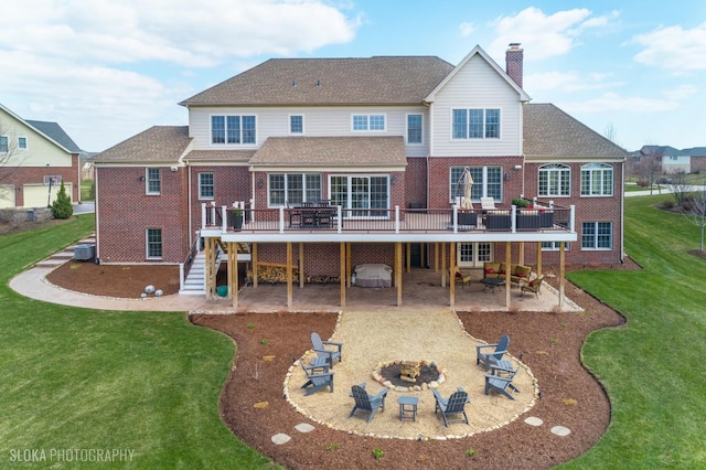 6 Shenandoah Cir S, Barrington, IL 60010 - rear view of property with stairs, a deck, a patio area, an outdoor fire pit, and brick siding