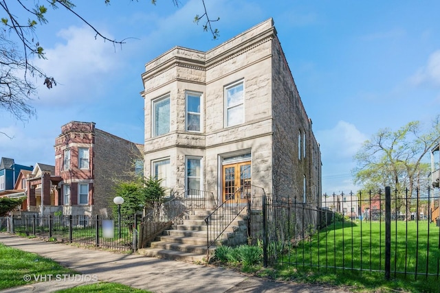 7206 S Champlain Ave, Chicago, IL 60619 - view of front of property with stone siding and french doors