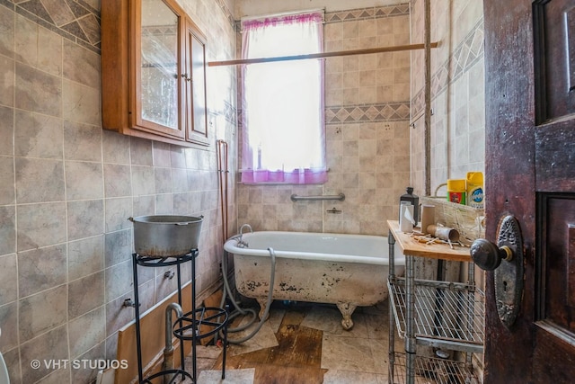7206 S Champlain Ave, Chicago, IL 60619 - bathroom featuring tile walls and a freestanding tub