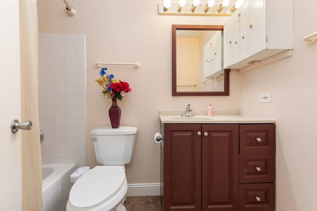 bathroom with vanity, baseboards, shower / tub combination, and toilet