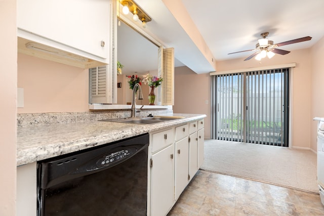 kitchen featuring a ceiling fan, dishwasher, a sink, light countertops, and white cabinetry