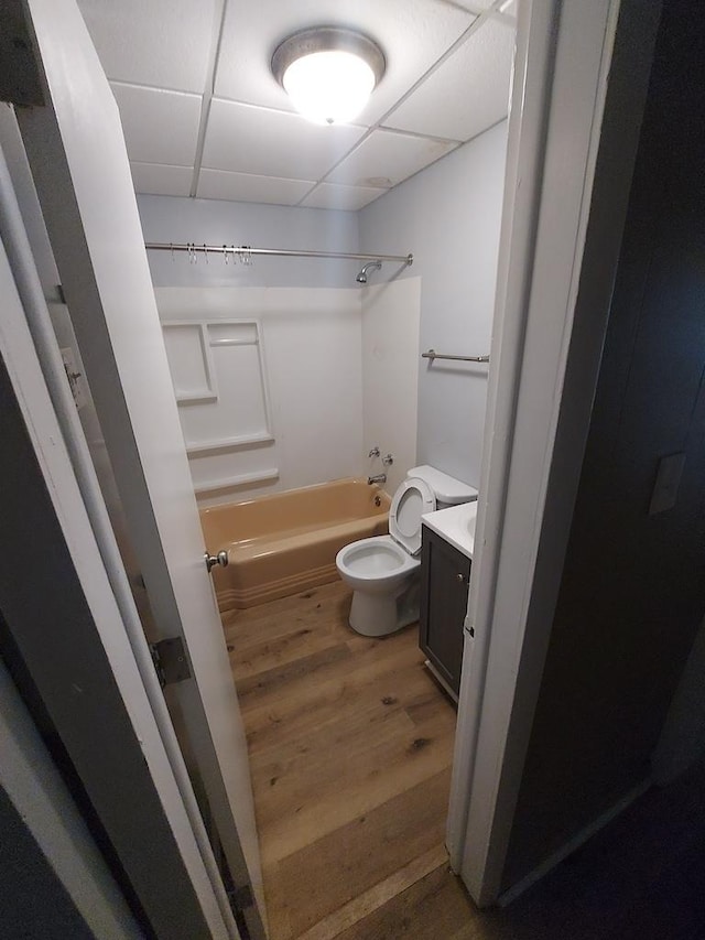 1616 S 7th St, Springfield, IL 62703 - full bath featuring wood finished floors, vanity, a drop ceiling, shower / washtub combination, and toilet