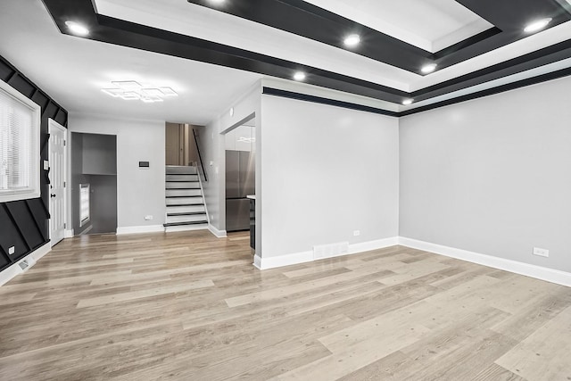 1158 W 111th St, Chicago, IL 60643 - below grade area with baseboards, light wood-type flooring, and stairs