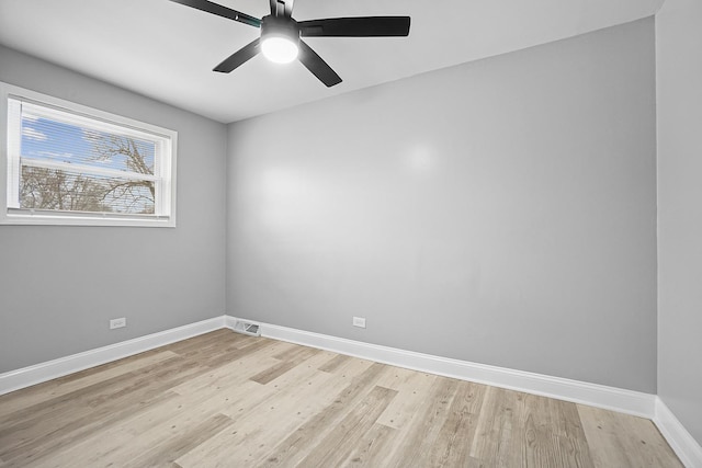 1158 W 111th St, Chicago, IL 60643 - empty room featuring visible vents, light wood-style flooring, a ceiling fan, and baseboards
