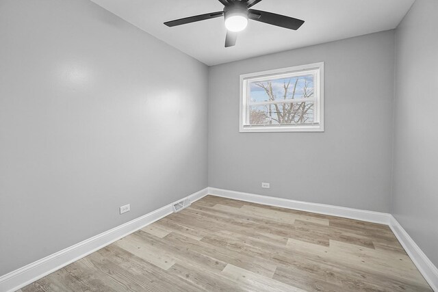 1158 W 111th St, Chicago, IL 60643 - spare room featuring visible vents, baseboards, light wood finished floors, and ceiling fan