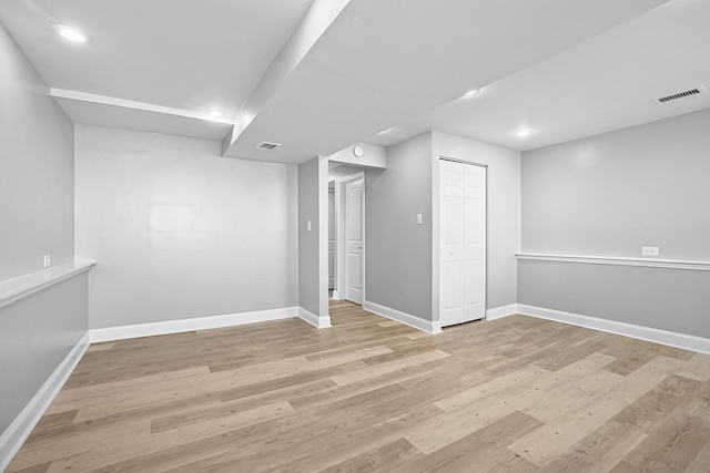 1158 W 111th St, Chicago, IL 60643 - finished below grade area featuring visible vents, baseboards, and wood finished floors