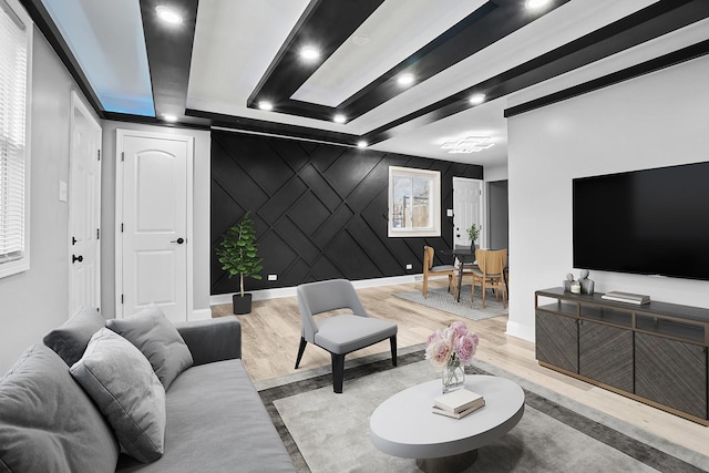 1158 W 111th St, Chicago, IL 60643 - living room with wood finished floors, an accent wall, and baseboards