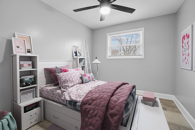 1158 W 111th St, Chicago, IL 60643 - bedroom with light wood-style floors, ceiling fan, and baseboards