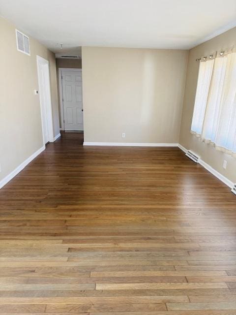 1507 7th St, Winthrop Harbor, IL 60096 - spare room featuring hardwood / wood-style flooring and baseboards