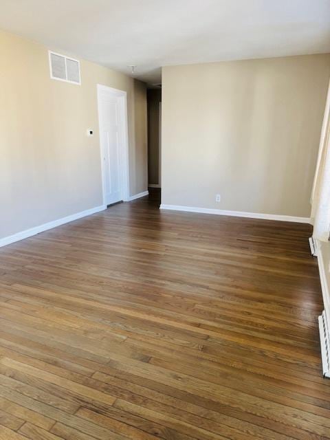 1507 7th St, Winthrop Harbor, IL 60096 - empty room featuring wood finished floors and baseboards