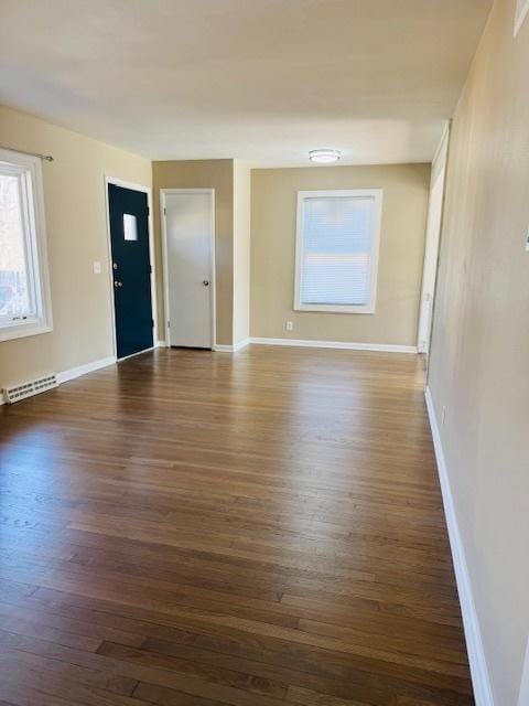 1507 7th St, Winthrop Harbor, IL 60096 - spare room featuring dark wood finished floors and baseboards