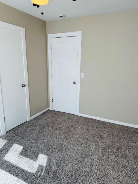 1507 7th St, Winthrop Harbor, IL 60096 - unfurnished bedroom with carpet and ceiling fan
