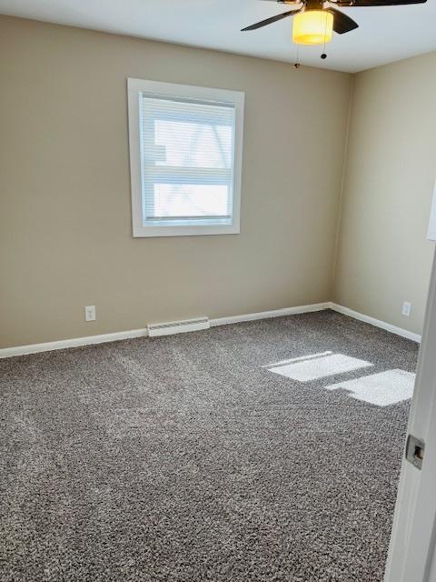 1507 7th St, Winthrop Harbor, IL 60096 - carpeted empty room with a ceiling fan and baseboards
