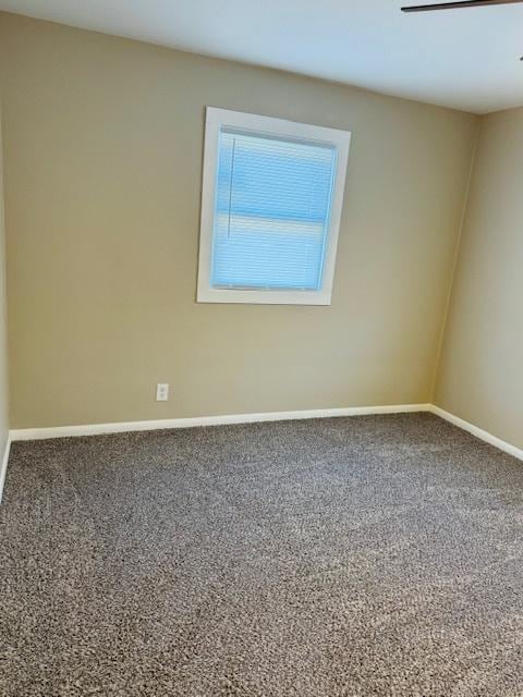 1507 7th St, Winthrop Harbor, IL 60096 - empty room with baseboards and carpet